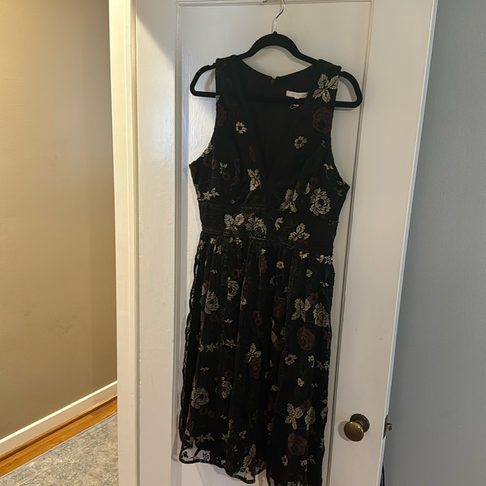 Floral embroidery cocktail dress.  Embroidery in deep maroon and gold.